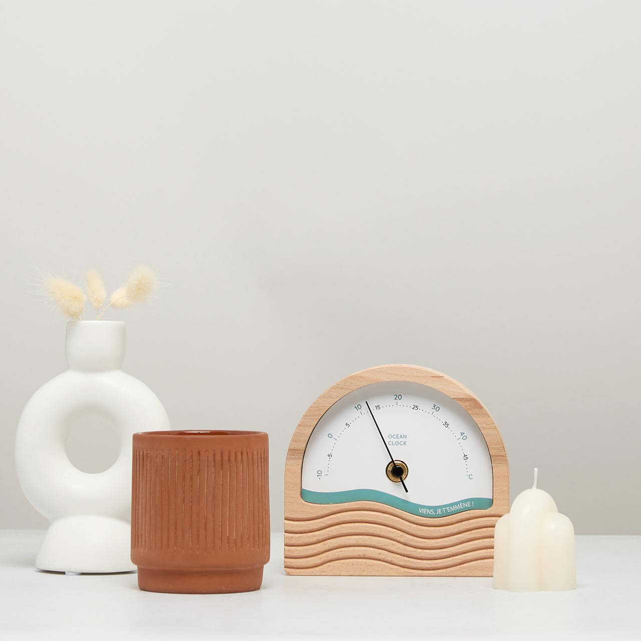 wooden celsius thermometer and white dial with inscriptions and turquoise wave personalized